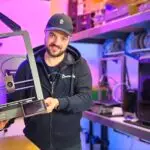 a man holding a metal object